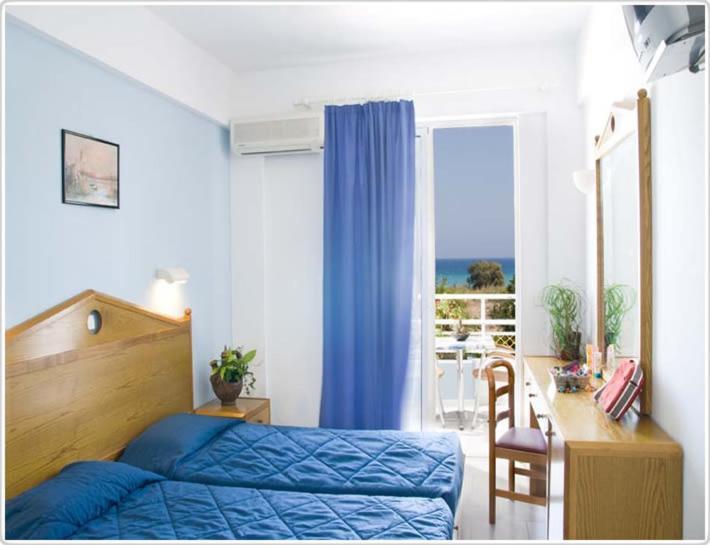 Corellia Asterias Beach Hotel Теологос Номер фото